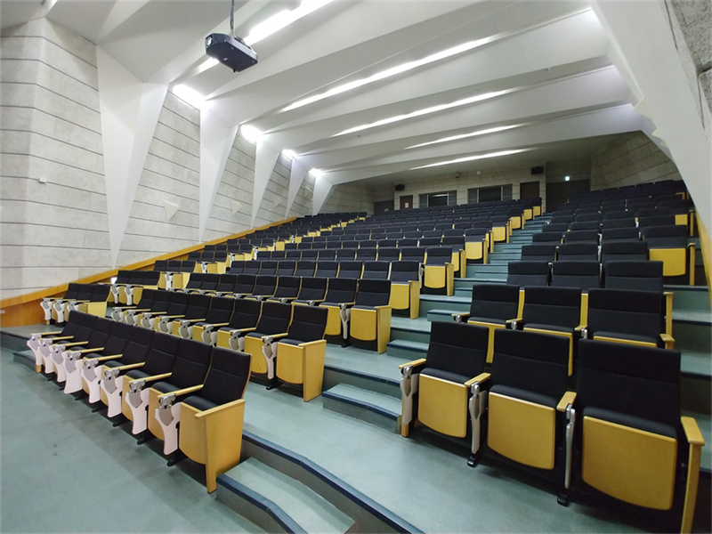 Using Dampers in Auditorium Chairs